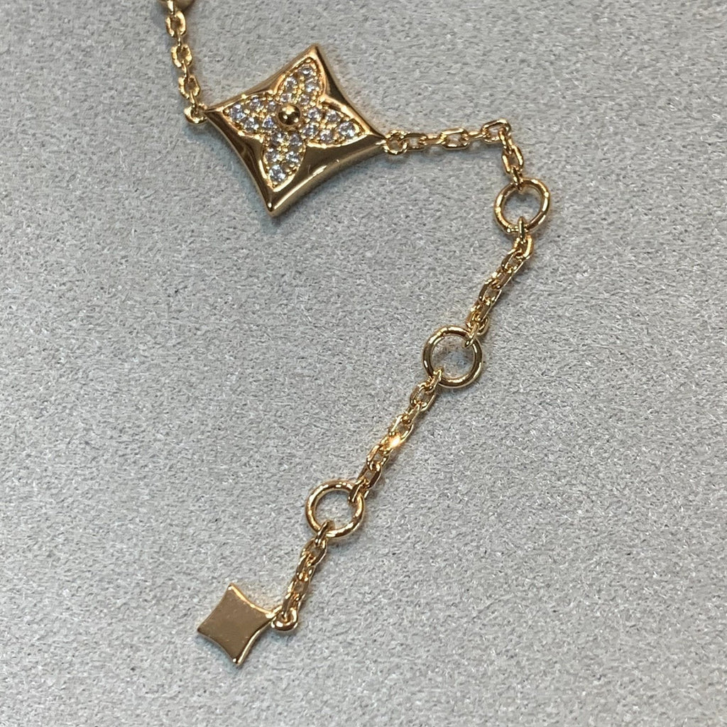 LOUIS VUITTON STAR AND SUN 4 MOTIFS GOLD DIAMONDS BRACELET