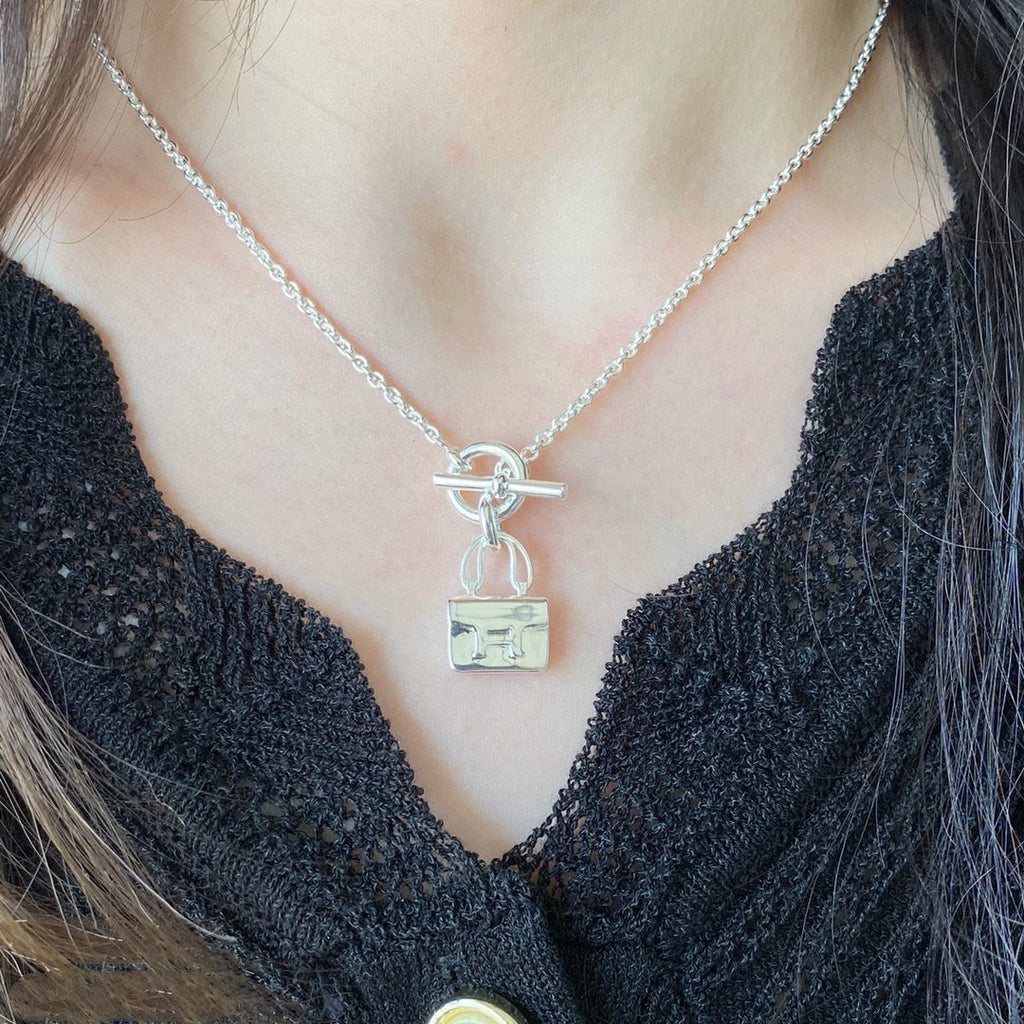 HERMES CONSTANCE PEDANT SILVER NECKLACE